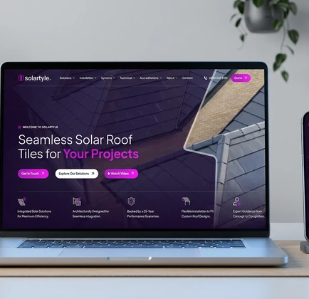 Premium service brand website shown on laptop and phone