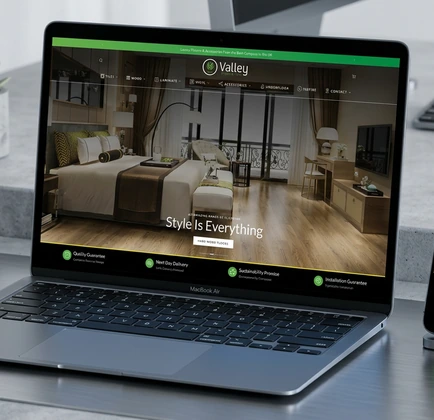 B2B consultancy site shown on premium laptop and phone mockups