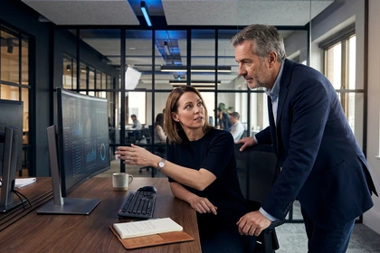 Human review and escalation for an AI-assisted business decision